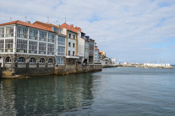 Houses on the edge of the sea in Luanco, Asturias