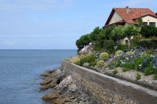 Houses on the edge of the sea in Luanco, Asturias