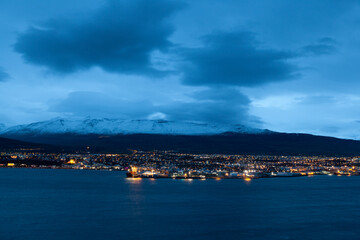 Naklejka na ściany i meble Panoramic view of Akureyri at dusk, Iceland