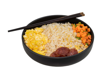 vegetable fried rice with sausage egg carrot bean in black bowl isolated on white background has chopsticks close up, top view, food, and drink concept.