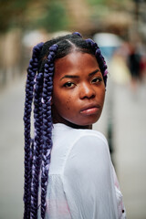 Portrait of a black girl walking in the city