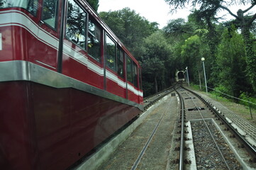 Rail system vehicle entering the funicular tunnel