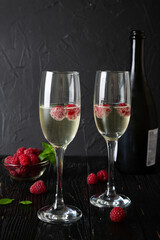 Champagne with fresh raspberries