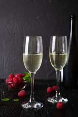 Champagne with fresh raspberries