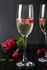 Champagne with fresh raspberries