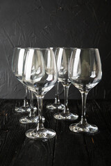 Empty wine glasses on dark background
