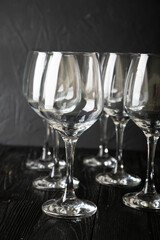Empty wine glasses on dark background