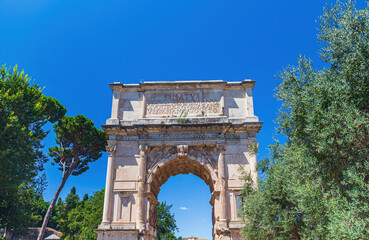 Fototapeta na wymiar Arch of Titus on the Via Sacra, Rome, Italy