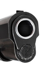 Muzzle of a pistol quartering toward the camera