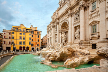 Fototapeta na wymiar Trevi Fountain (Fontana di Trevi) in the morning light in Rome, Italy. Trevi is most famous fountain of Rome. Architecture and landmark of Rome.