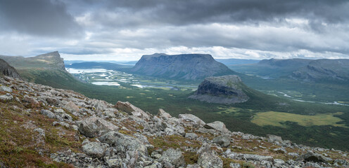 Vast arctic landscape of Sarek National Park in Swedish Lapland with Rapa valley, Tjahkelij,...