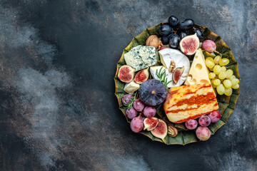 French cheese collection camembert, emmental, marble delicous cheese, blue cheese french, dorblu, mold, roquefort, cheese platter, snacks. place for text, top view