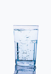 A glass of water with bubble isolated on white background.