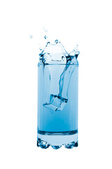 Blue softdrink with ice cube isolated on white background.