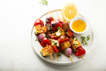 Vegetable skewers with halloumi cheese