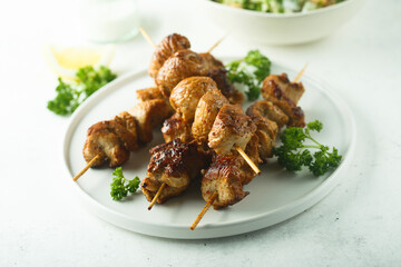 Healthy chicken skewers with lemon