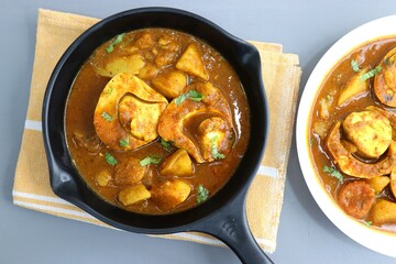 Indian non-vegetarian food  Homemade Egg Curry or Anda masala gravy, baida curry. Indian spicy food. Perfect Indian lunch. over moody background with copy space.