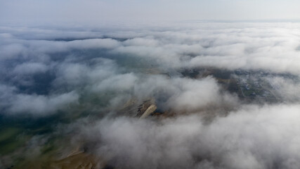 Aerial View from of the fog forest and the sea