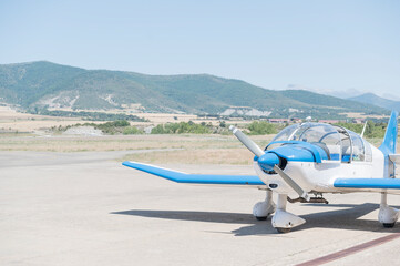 Small plane cockpit on the airfield runway
