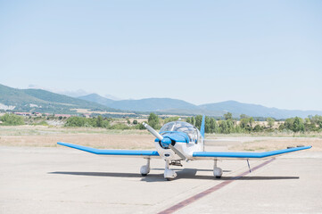 Small plane on the airfield runway