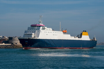 Portsmouth, England, UK. 2021.  RORO freight ferry with cargo of trucks underway.