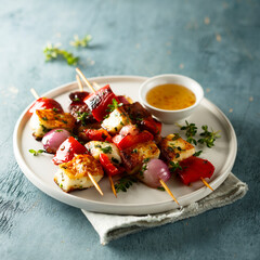 Vegetable skewers with halloumi cheese