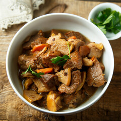 Quince pork ragout with vegetables
