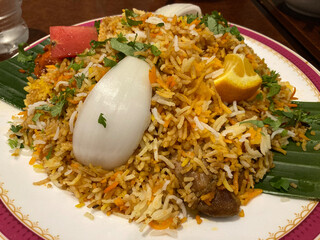 Chiken Biriyani at Indian Restaurant with Variety of Spice, Vegetable and Fruits