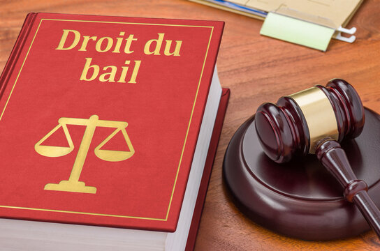A law book with a gavel - Tenancy Law in french - Droit du bail