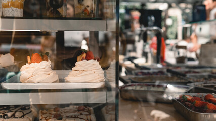 Cake displayed in shop window of confectionery or cafe