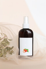 Eco friendly Bottle or jar with natural skincare cosmetics, creams or oils on light background. Plant-based beauty products