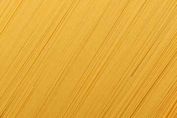 Background of raw spaghetti pasta, cappellini