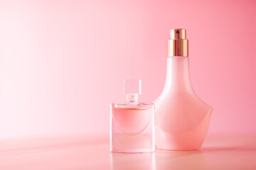 Perfume bottles, luxury set on pink background.