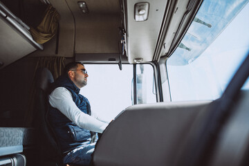 Man driver of the lorry in a logistic company