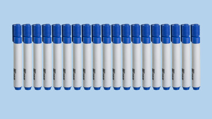 markers lined up on a blue background