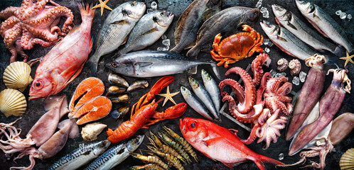 Assortment of fresh fish and seafood - obrazy, fototapety, plakaty