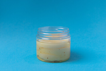 Cosmetic fabric patches for moisturizing and nourishing the skin under the eyes on blue background.Skin care.