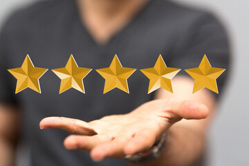 pointing five star symbol to increase rating of company