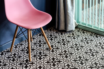 colorful retro furniture interior design detail with vintage tiles and chair