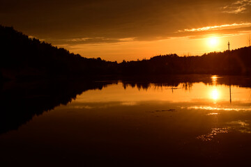 the sun over the lake