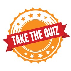 TAKE THE QUIZ text on red orange ribbon stamp.