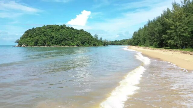 Aerial drone view of small island near tropical Layan Beach area in Phuket, Thailand