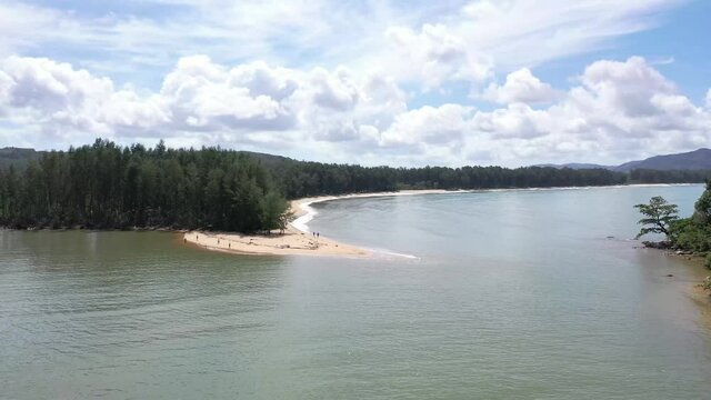Aerial drone view of small island near tropical Layan Beach area in Phuket, Thailand