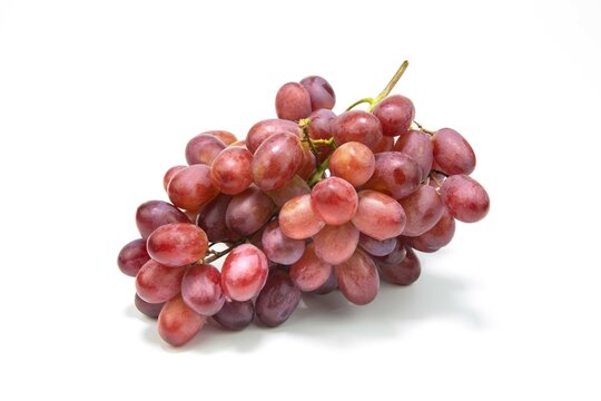 Red grape pink bunch isolated on white background