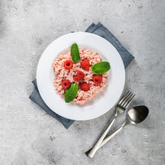 Fresh raspberries risotto a delicate and elegant dish