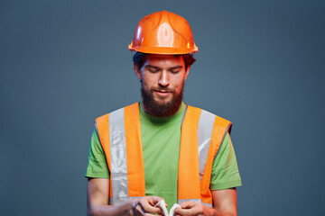 man in orange hard hat construction safety professional work