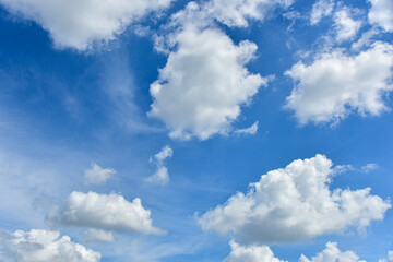 Obraz na płótnie Canvas Beautiful white clouds on blue sky background.