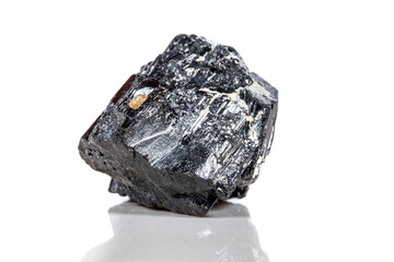 macro mineral stone sherle, schorl, black tourmaline on white background