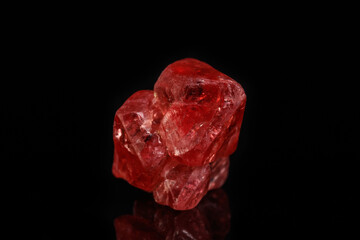 Macro mineral spinel stone on black background