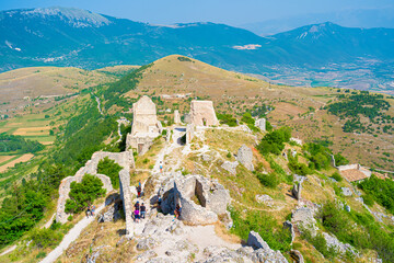 Fototapeta premium Old Calascio village ruins, near to castle of Rocca Calascio, Aquila, Abruzzo, Italy. Part of Gran Sasso National Park, location for several film scenes, one of 15 most beautiful castle in the world